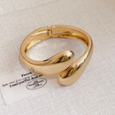 Pulseira Feminina Gota Brilhante – Dourado/Prata – Acessório de Luxo