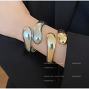 Pulseira Feminina Gota Brilhante – Dourado/Prata – Acessório de Luxo
