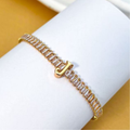PULSEIRA DE LETRA INCRUSTADO COM ZIRCÔNIA BRILHANTE BANHADA EM OURO 18K