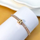 PULSEIRA DE LETRA INCRUSTADO COM ZIRCÔNIA BRILHANTE BANHADA EM OURO 18K