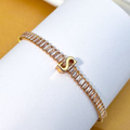 PULSEIRA DE LETRA INCRUSTADO COM ZIRCÔNIA BRILHANTE BANHADA EM OURO 18K
